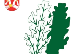 Kuvassa Karjalan vaakuna ja tammenlehvätunnus.
